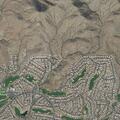 Person experiencing abdominal pain at home in Anthem