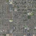 Person experiencing abdominal pain at apartment