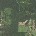 Roadside fire near landfill area in De Queen