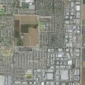 Person experiencing chest pain behind apartment complex