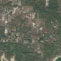 Grass fire threatens structures on Ozark Loop