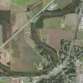 Injury crash near W 3rd St; vehicle hit utility poles