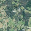 Wood fire near hay bales on Crumps Bridge Road