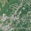 Person with chest pain lying on sidewalk in Laurens