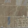Burned vehicle or encampment reported in Victorville