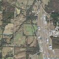 Wildland fire burning south of Mena airport