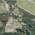 Tree limb creating traffic hazard near landfill