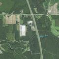 Caller reports person seen in woods near home