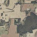 Old leaning utility pole reported behind residence