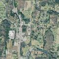 Man camping in woods near daycare and gas station