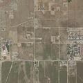 Smoke investigation linked to nearby grass fire