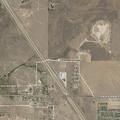Possible wrong-way white sedan on I-27 near Canyon split