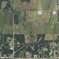 Caller reports suspicious vehicle near County Road (number withheld)