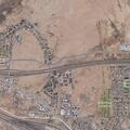 Report of woman in vehicle possibly armed with a pistol