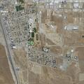 Person experiencing abdominal pain at Mojave apartment