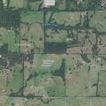 Grass and hay bale fire spreads near Cameron home