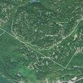Teen walking in dark near curve on Signal Mountain