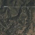 Juvenile throwing rocks at caller in Sandia Park