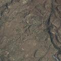 Female experiencing abdominal pain above navel in Sandia Park