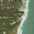 50-year-old male injured by surfboard stand on beach