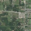 Brush fire near homes on West Highway 255