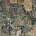 Woman trespassing and climbing gate at rural home