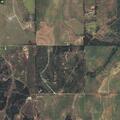 Grass fire threatens barns and trees near Hinton