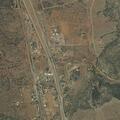 Smoke column reported near mile marker 4 on NM 63
