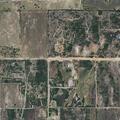 Person with possible broken leg in a field near Cheyenne