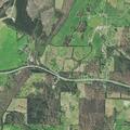 Vehicle overturns in creek on Highway 68
