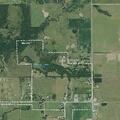 Driver holding baby while driving on Old Morris Hwy
