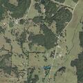 Grass fire spreading near property line