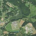 Man with abdominal pain at care facility in Morganton