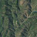 Debris pile sends creek water over Big Creek Road