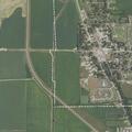 Pickup truck overturned in ditch at intersection