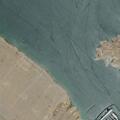Officers monitor unknown floating object near beach