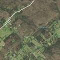 Tractor stuck on ramp to Raccoon Valley Drive