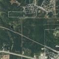 Woman stumbling near car off highway 51 in Mannford