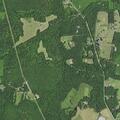 Large brush fire spreading into back woods