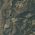 Structure fire in wildland area on Bear Creek Drive