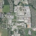 Truck hits multiple vehicles in repair shop lot
