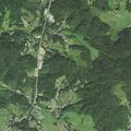 Intoxicated man by silver SUV at campground road