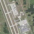 Person with severe back pain at airport boulevard