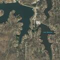 Boat shining light toward home on Lake Sequoyah