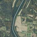18-year-old male holding onto log in river rescue