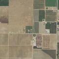 Suspicious man in black near Visalia property