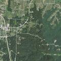 Officers search for wanted person near Farm Road (number withheld)