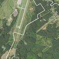 Person experiencing abdominal distress near Airport Road