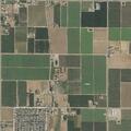 Person experiencing abdominal pain near Reedley