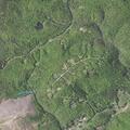 Woman with chest pain and nausea at campsite